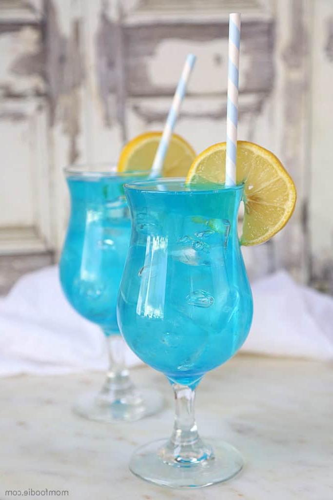 bright blue drinks with lemon slices