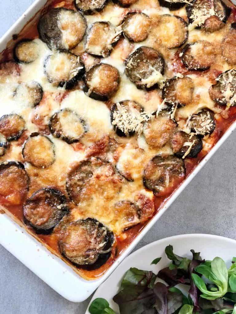 white pan of eggplant parmesan 