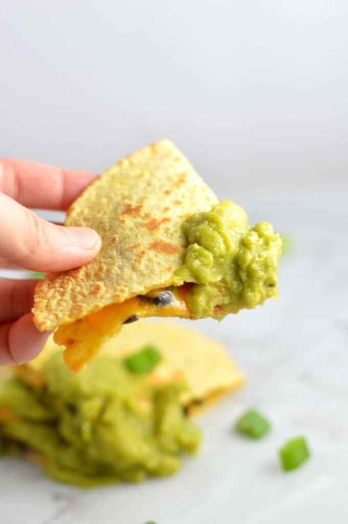 quesadilla dipped in guacamole 