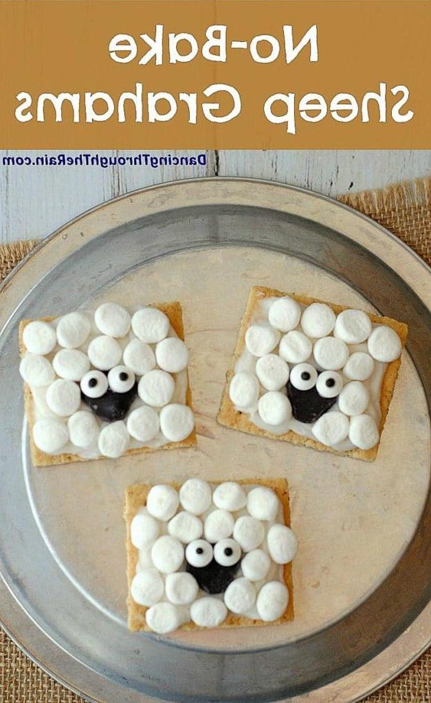 graham crackers decorated with marshmallows like sheep 