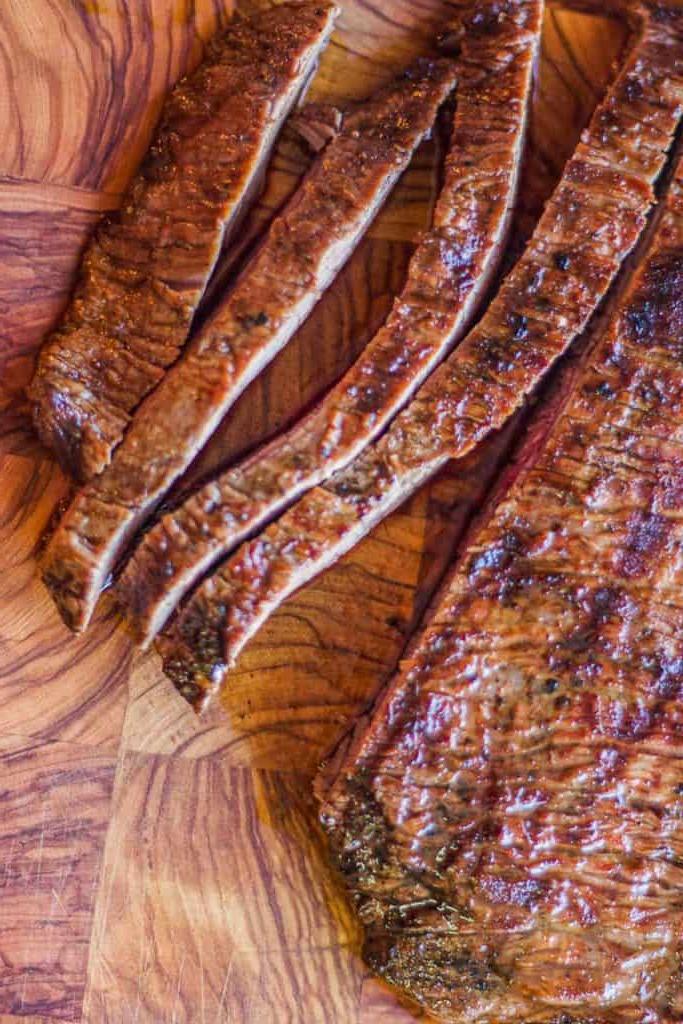 carne asada sliced on cutting board