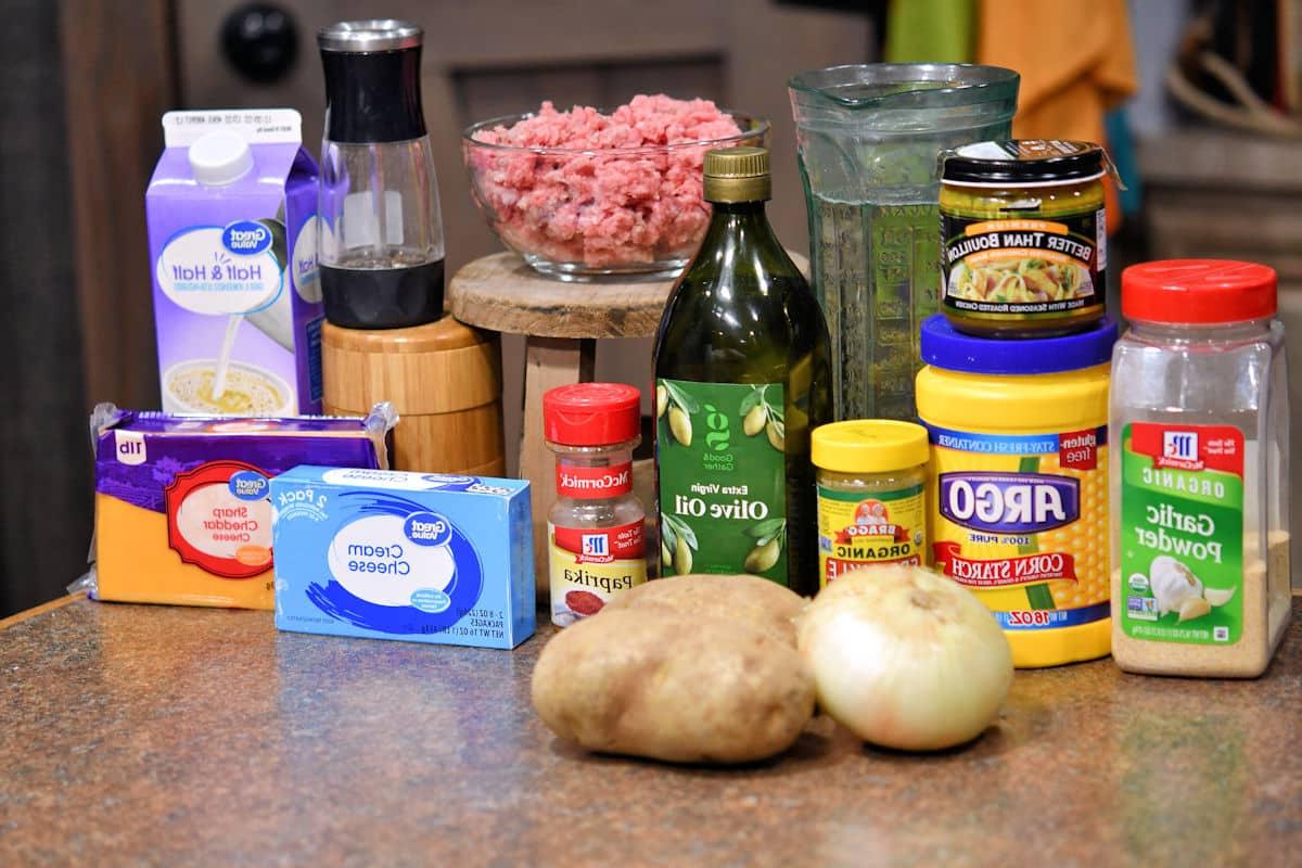 ingredients for cheeseburger soup on a countertop