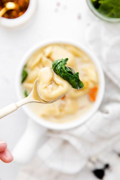 spoon with tortellini on it