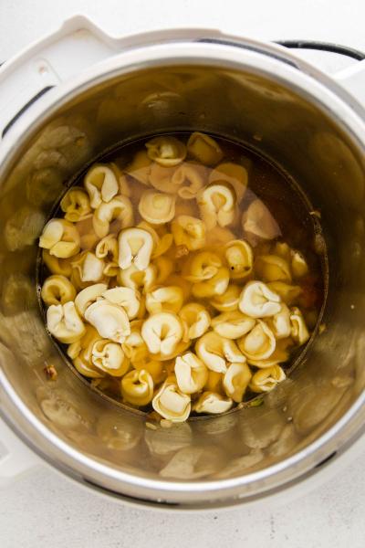 tortellini tossed into the bowl of instant pot