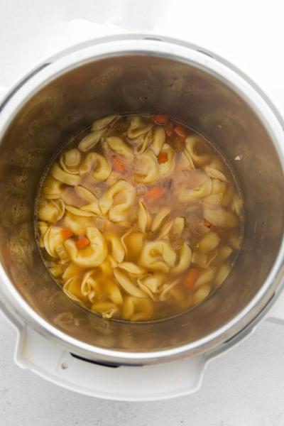 tortellini shown after cooking in instant pot